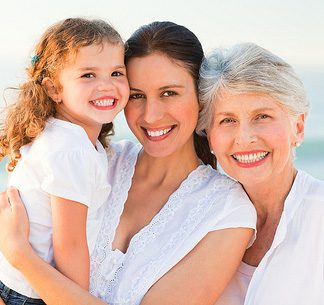 Three generation ladies wearing white attire