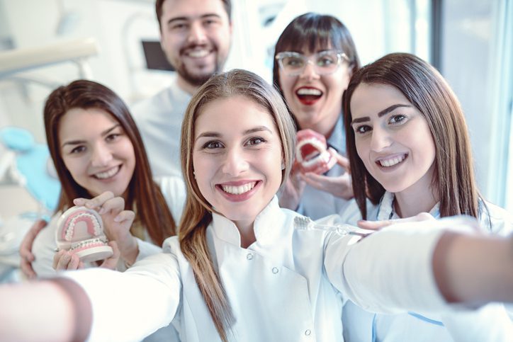 Happy Dentists taking selfie
